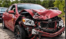 Crashed red car