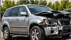 Smashed silver car
